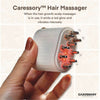An image of Caressory™ Hair Massager and red light scalp massager held in hand, emitting a red glow and vibrating for hair growth and scalp massage.